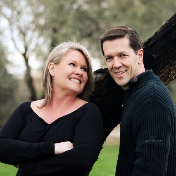 Photo of a couple in which the woman is looking at the man and smiling. This represents how marriage counseling in NC and VA can help improve your relationship.