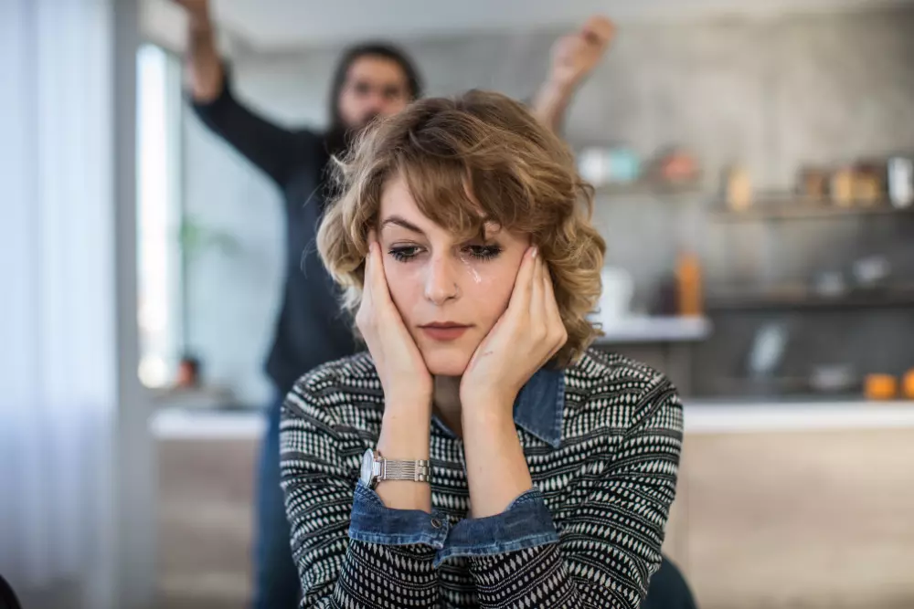 Photo of a woman crying while her partner is screaming in the background. Are you wondering what to do when you’re in a difficult relationship? Learn 4 possible choices you have to deal with it. Working with a relationship therapist can make a big difference. Seek help today from a NC or VA therapist at Deep Connections Counseling.