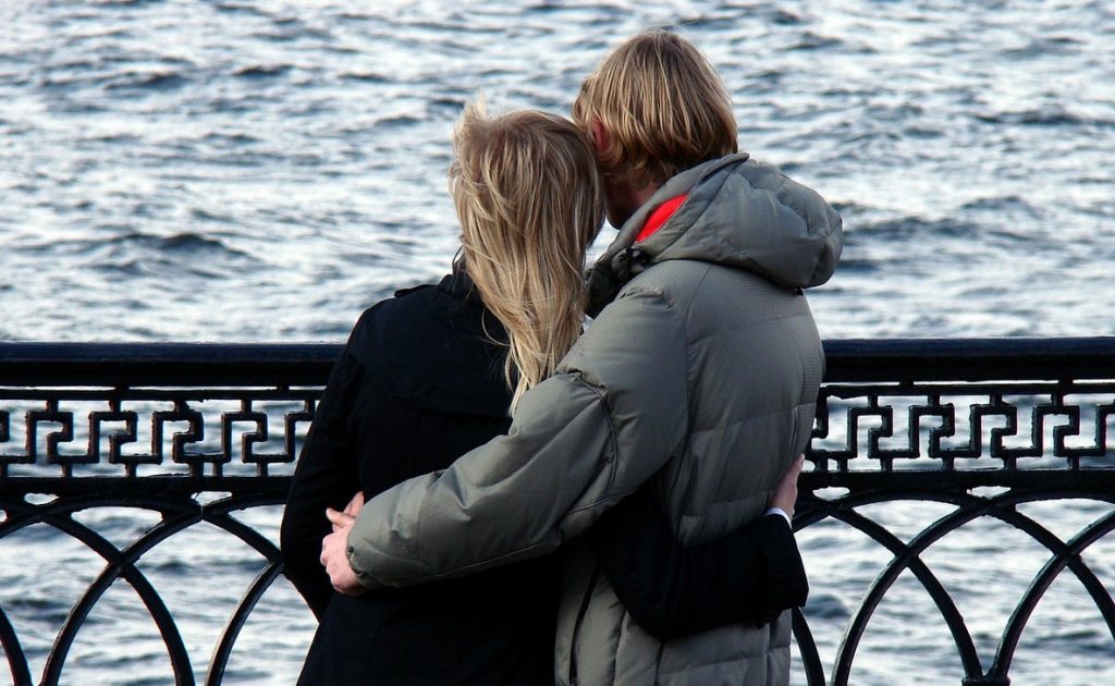 Photo of a couple hugging and looking at the sea. When faced with these insecurities, don’t turn away. Work for the relationships that you still have in your life and argue against insecure thoughts that come from feelings of loneliness. Couple Therapy For Empty Nesters And Couples In Midlife Crises can help you find purpose in this new phase of your life.