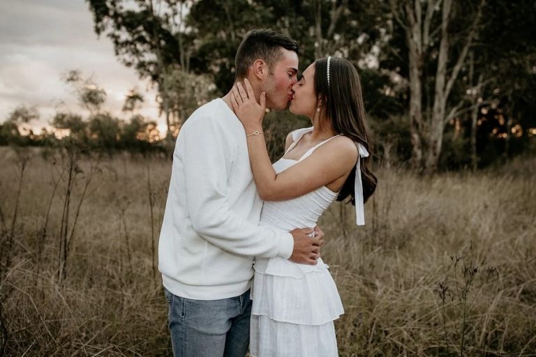 Photo of a recently married couple kissing each other. This represents how counseling for relationships can help you and your partner feel closer.