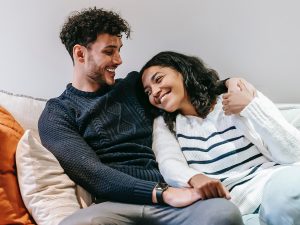 Photo of a cross-cultural couple reconnecting in couples therapy. This represents how you can experience the benefits of marriage counseling in NC and strengthen your relationship with your partner.